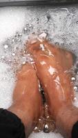 Enjoy a Relaxing Foot Soak in Bubbles for Ultimate Comfort and Rejuvenation video