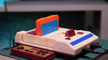 Person inserting cartridge into retro game console. Retro game console with cartridge video