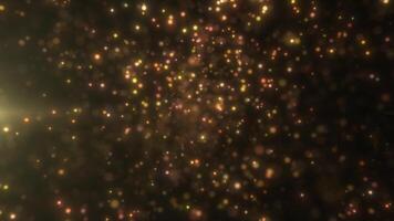 Gold and warm-toned bokeh lights create a magical and festive effect on a dark background, ideal for celebrations video