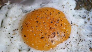A CloseUp View of Fried Eggs Cooking in a Pan, Perfect for Breakfast video