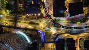 Aerial Time-lapse Of Evening Traffic At Intersection In Kuala Lumpur, Malaysia video
