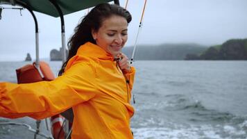 Carefree Woman Enjoying Cold Wind During Sailboat Trip, Journey To Islands In Atlantic Ocean video