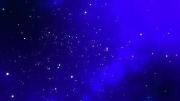 Glistening, multicolored particles moving in an abstract animation against a blue background. footage. Vibrant animation video