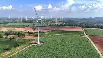 wind farm wind turbines scattered across a lush agricultural landscape, highlighting renewable energy production, sustainability, and environmental harmony. video