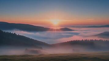 Sunrise Over Misty Mountains A breathtaking panorama of rolling hills and dense forests bathed in the golden glow of sunrise, with a veil of mist adding an ethereal touch. video