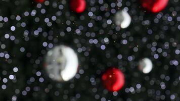 The magical particle sparkle explosion particles glow with Christmas theme color on black background. video