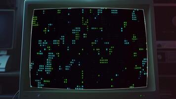a computer monitor with a lot of green dots on it video