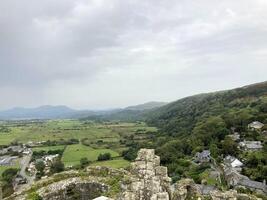 A view of a village and mountains from a castle photo