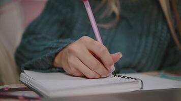 Close Up of Hand Writing Notes in Notebook video