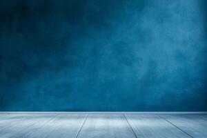 A minimalist blue wall with a wooden floor, ideal for backgrounds or presentations. photo