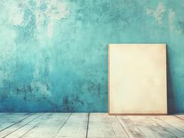 A blank canvas against a textured turquoise wall, ideal for artistic display or inspiration. photo