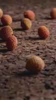 Fresh lychees falling, close up video