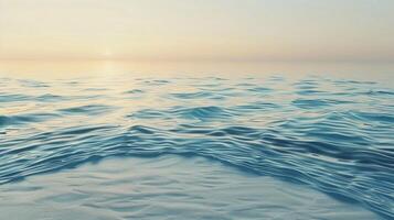 A large ocean with waves and sun setting photo