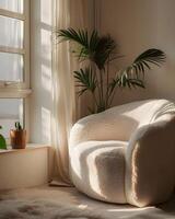 A white chair sitting next to a window photo