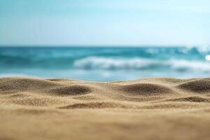 A sandy beach with waves and blue sky photo