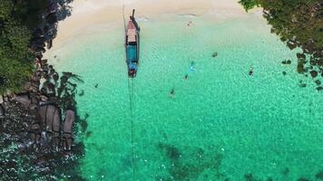 Aerial View of Serene Beach with Longtail Boat on Phi Phi Island video
