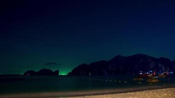 Nighttime View of Phi Phi Island with Longtail Boats and Cliffs video