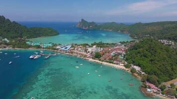 Aerial View of Phi Phi Island Harbor with Boats and Limestone Cliffs video
