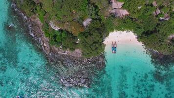 Aerial View of Phi Phi Island Coastline with Boats and Turquoise Waters video