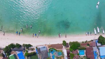 Aerial View of Phi Phi Island Beach with Boats and Turquoise Waters video