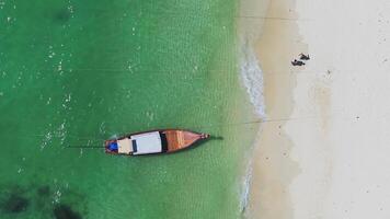 Aerial View of Pristine Beach and Long Tail Boats on Phi Phi Island video