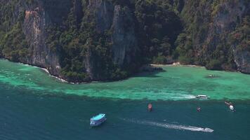 Aerial View of Phi Phi Island's Turquoise Waters and Green Cliffs video