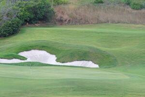 Conceptual golf photo with a green put