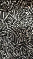 Close-up View of Numerous Cylindrical Set Screws photo