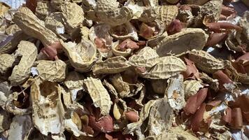 Pile of Broken and Discarded Peanut Shells photo
