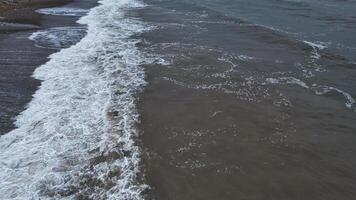 Aerial View of Ocean Waves and Shoreline photo