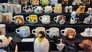 Animal-Themed Ceramic Mugs and Salt and Pepper Shakers Display photo