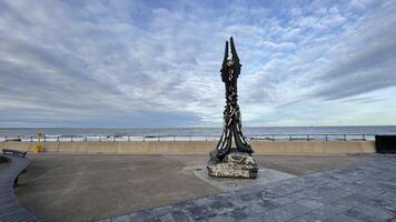 Coastal Chain Sculpture and Seascape in Redcar, UK photo