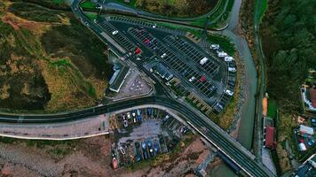 Aerial View of Coastal Parking Lot, Boats, and River in Saltburn by the Sea photo