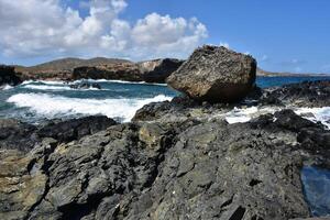 Wild Raucuous Waves Splashing on Lava Rocks photo