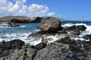 Beautiful Crashing Waves in Rural Rugged Aruba photo