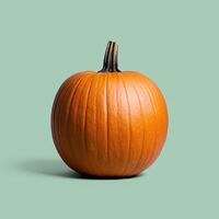 Ripe pumpkin on a teal backdrop photo