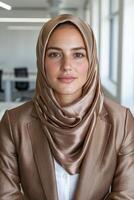 Portrait of a confident businesswoman wearing a hijab photo