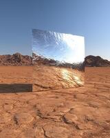 Reflective metallic structure in a desert landscape photo