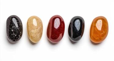 five different colored stones are arranged in a row photo