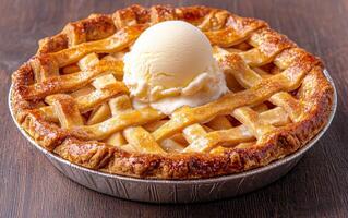 Delicious apple pie with a scoop of vanilla ice cream photo