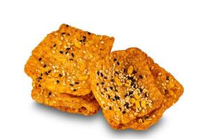 High angle view pile of square shape crispy homemade multigrain rice cracker. photo