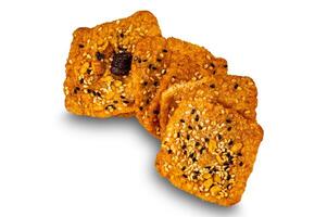 High angle view of square shape crispy homemade multigrain rice cracker. photo