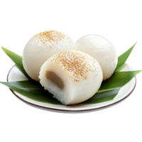 Soft, round dumplings topped with sesame seeds, presented on a plate with leaves, showcasing their delicate texture and smooth surface. png