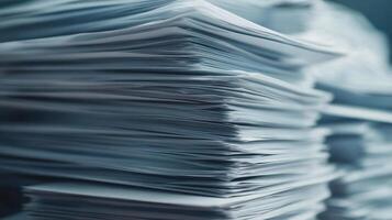 Stacks of clean cut tax forms surrounded by layered paper create organized yet overwhelming scene photo