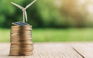 stack of coins with miniature wind turbine and solar panel symbolizes renewable energy investment and sustainability photo