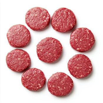Fresh raw burger patties arranged in circular pattern, showcasing their texture and color. Perfect for grilling photo