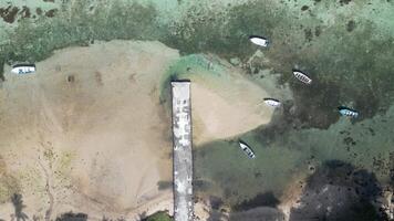 Famous Harbor Pier in Baie du Cap Beach Mauritius Island in Mauritius . Top Down View Recreation. video