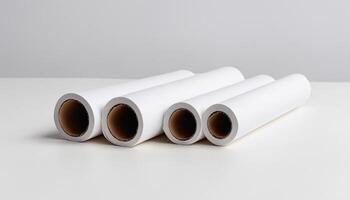 Three rolls of white paper on a table photo