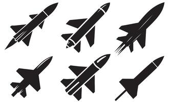 Silhouettes of Missiles in Flight Set vector