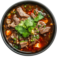 Spicy beef soup with fresh herbs and vegetables served in a black bowl isolated on a transparent background, spicy beef soup top view isolated on transparent background png